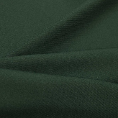 Ткань костюмная 21010 2076, 225 гр/м2, шир.150см, цвет т.зеленый - купить в Рубцовске. Цена 394.71 руб.